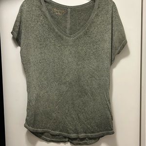 Maurice’s olive green shirt